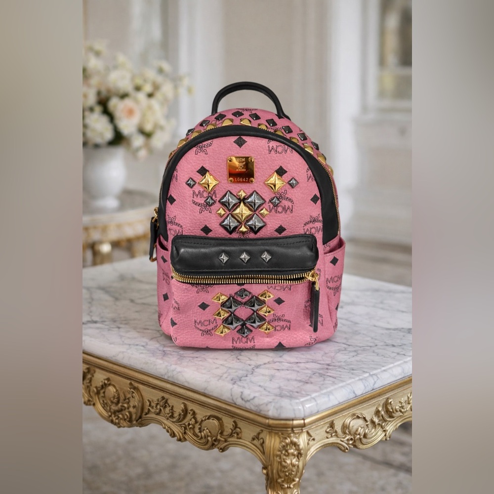MCM Pink and Black Backpack with Gold Accents